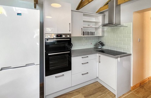 New Romney Cottage | Very spacious property across the road from a lovely golden sanded beach.