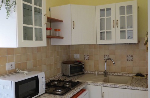 Porto Azzurro Apartment | View on the bay of Porto Azzurro, 50 meters from the beach