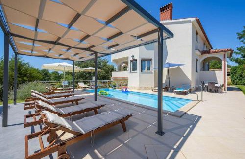 Zbandaj Villa | Villa Eufemia by Briskva