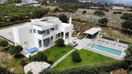 Tria Monastiria Villa | Villa Mia Heated pool Pickleball court kids area Center 8 min beach 2km