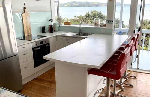 Red Beach House | Vintage Retro style Bach with stunning sea views