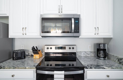 Florida Central Atlantic Coast Condo | Vista Cay Lakeview Chic. Next to Pool, Walk to Epic Universe and the OCCC