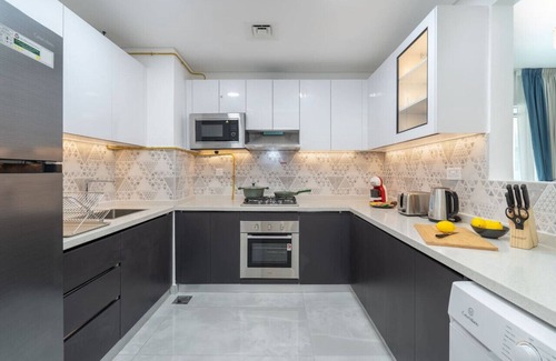 Discovery Gardens Apartment | Vogue | Elegance at Pearlz near Metro