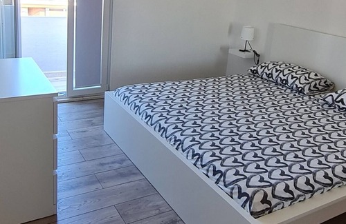 Oristano Apartment | Vrbo Property