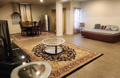 Triangle House | Walk in sunny furnished basement with 2 bedrooms and 2 bathrooms