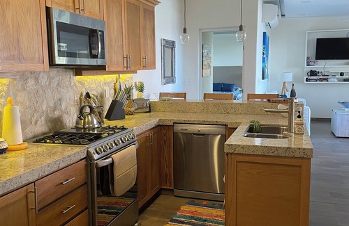 Bajos de Chila Condo | Walk out to pool and ocean steps away.