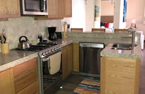 Bajos de Chila Condo | Walk out to pool and ocean steps away.