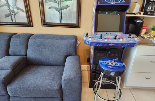 Daytona Beach Condo | Walk right out to the beach, pool and tiki bar from this 1 bedroom deluxe condo