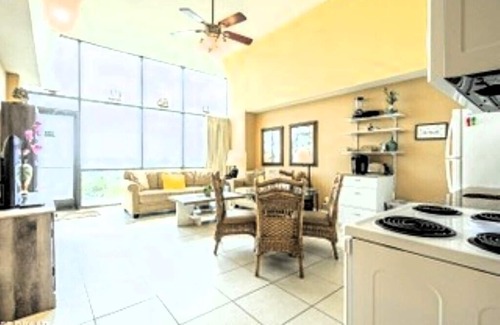 Daytona Beach Condo | Walk right out to the beach, pool and tiki bar from this 1 bedroom deluxe condo