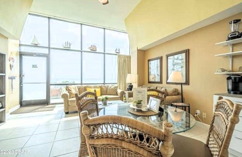 Daytona Beach Condo | Walk right out to the beach, pool and tiki bar from this 1 bedroom deluxe condo