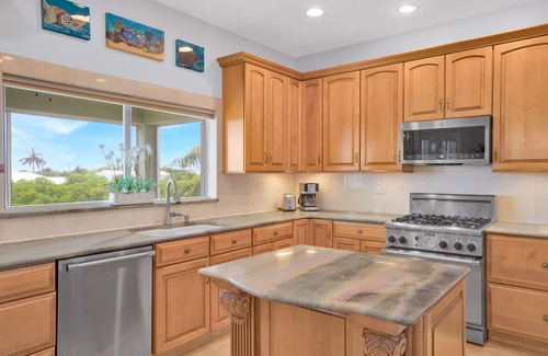 Marathon House | Walk to Beach, 90’ Dock, Huge Pool, Lux Home