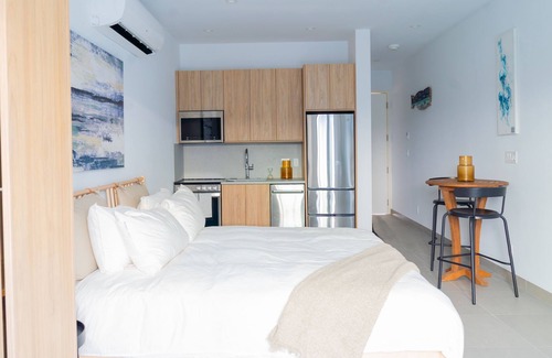 Grace Bay Apartment | Walk to Grace Bay- Stunning Pool Views ! Z-B303
