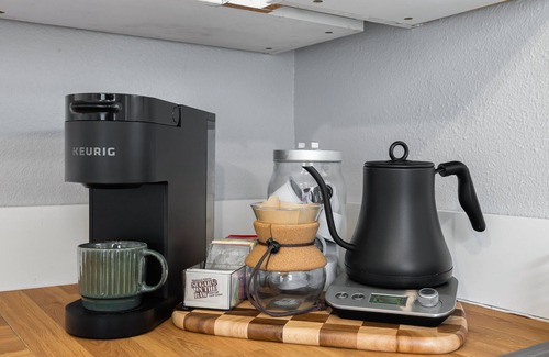 Hilltop Apartment | Walkable Neighborhood. King Bed. Central AC. Pet Friendly