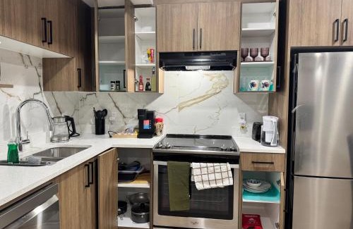 Airdrie Apartment | Walkout basement suite with canal view near airport