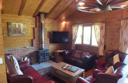 Swanage House | Walnut Log Cabin