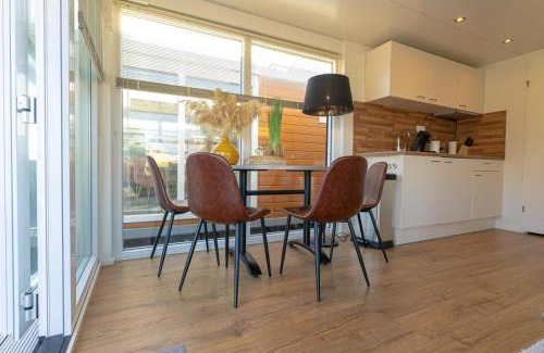 Monnickendam Boat Rental | Warm Winter Houseboat Tomio near Amsterdam