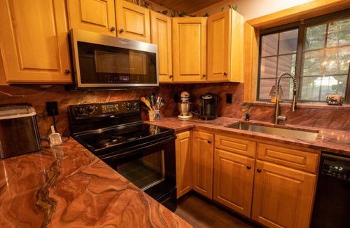 Crystal Lake Cabin | Warm Woodland Getaway with Land