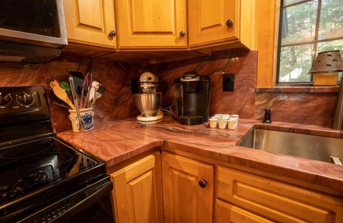 Crystal Lake Cabin | Warm Woodland Getaway with Land