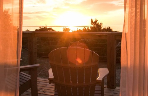 Waves Cottage | Waterfront 2-Bedroom, 1-Bathroom Cottage with a Hot tub and Waterfront Deck