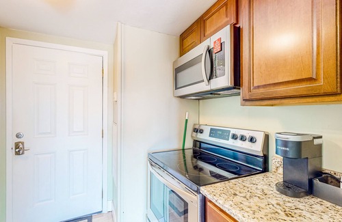 Fort Walton Beach Apartment | Waterfront condo featuring a lovely patio with views, AC, & pool access