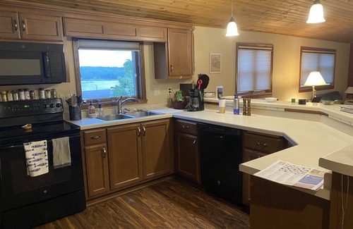 Gills Rock Condo | Waterfront condo - amazing sunsets. Atop Shoreline Restaurant by motel & marina.