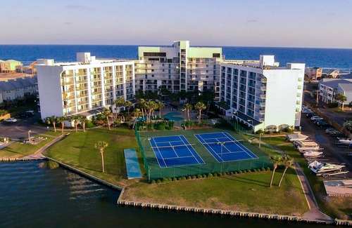 Ono Island Condo | Waterfront condo with balcony. Pool, hot tub, tennis, beach access.