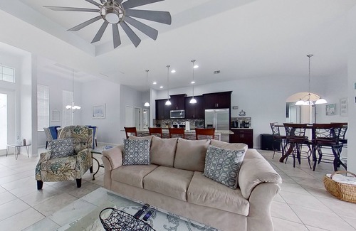 Trafalgar House | Waterfront home with private pool, dock, WiFi, central AC, and desk workspaces