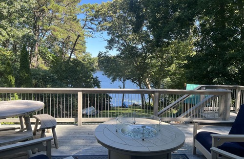 East Falmouth House | Waterfront on Lake! 6 bd, 2 bth. Central Air. Huge Deck. Paddle boat!