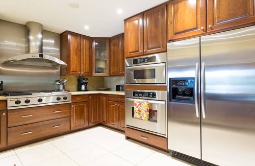 Sunset House | Waterfront Property with a resort style backyard and Heated Pool in Miami