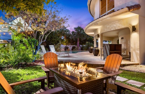 Oakland Park House | Waterfront Retreat: 7BR Villa with Pool & Firepit