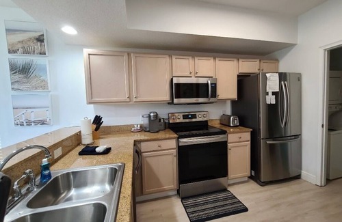 Fort Walton Beach Condo | WATERS EDGE unit 101- Heated pool and beach service included March- October