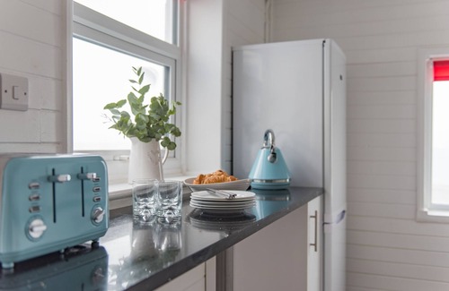 Sandgate Apartment | Wave Cottage - seaside cottage right on the beach by Bloom Stays
