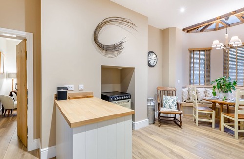 Driffield Cottage | We love this historic lodge with large garden and wood fired hot tub.