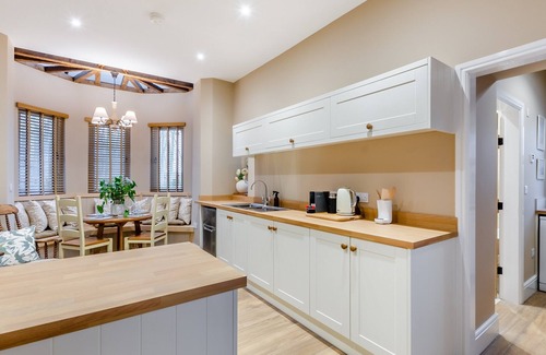 Driffield Cottage | We love this historic lodge with large garden and wood fired hot tub.