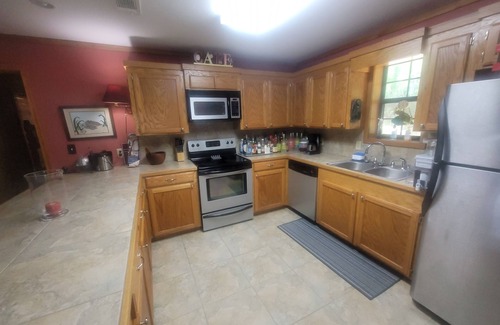 Acme Cottage | Weekend getaway at scenic Black River Lake with floating dock and boathouse.