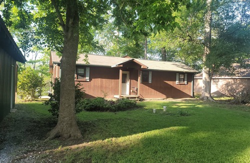 Acme Cottage | Weekend getaway at scenic Black River Lake with floating dock and boathouse.