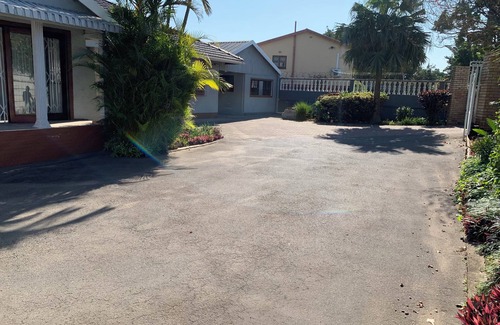 South Durban House | Welcome to Palm Haven on Sarnia, your urban retreat in the heart of Bellair.