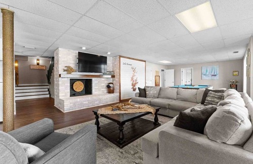 Mooresville Villa | Whiskey Sunsets: Stunning Peninsula Retreat with Panoramic Lake Views, Dock, Hot Tub, and More!