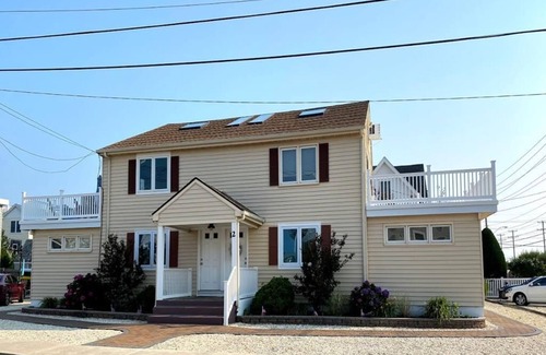 North Beach Haven Condo | Wi/Fi. Outdoor Shower. Beautifully remodeled 1st fl condo in a building of only 4 units on the oceanblock in Brant Beach. It is just steps from the beach and very close to the bay beach area which has swimming and a play area for children.