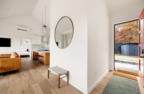 Young Harris Cabin | Wildcat Modern: Elegant mountain retreat with fire pit, deck, elevated furnishings, and pool and gym
