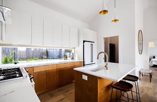 Young Harris Cabin | Wildcat Modern: Elegant mountain retreat with fire pit, deck, elevated furnishings, and pool and gym