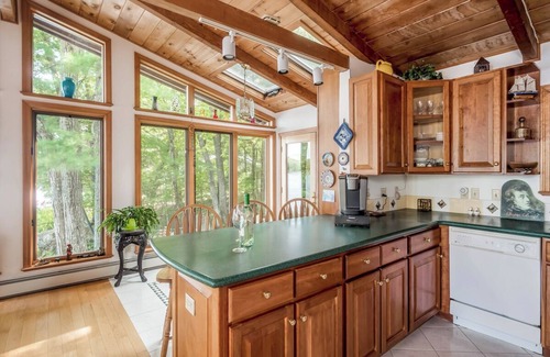 Moultonborough House | Winnipesaukee Waterfront Home For 12 Sand Beach and Dock For Two 24 Ft Boats