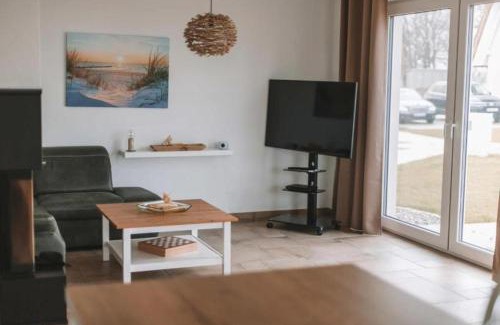 Am Salzhaff House | Wippezogel - Ferienhaus mit Sauna, Kamin und Meerblick