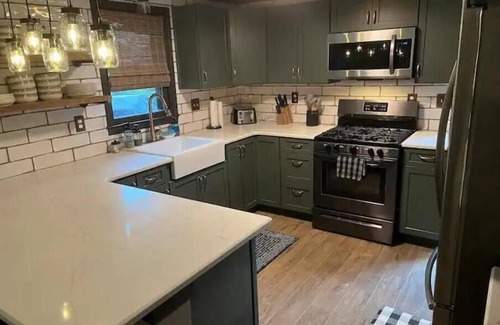 McHenry House | Wisp-ering Hideaway: 5 min to Wisp, covered hot tub, 2 firepits, Dogs, Arcade!