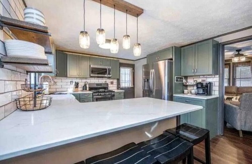 McHenry House | Wisp-ering Hideaway: 5 min to Wisp, covered hot tub, 2 firepits, Dogs, Arcade!