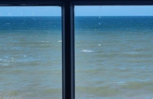 Sheringham Apartment | With its wonderful, far reaching sea views, this first floor apartment certainly does have the WOW f