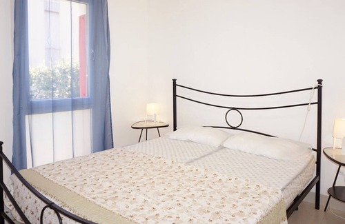 Porto Santa Margherita Apartment | Wonderful Apartment on the Ground Floor with Private Garden - Great Location