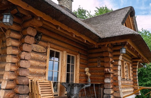 Lipowa House | Wooden holiday home in Lipowa with bubble bath