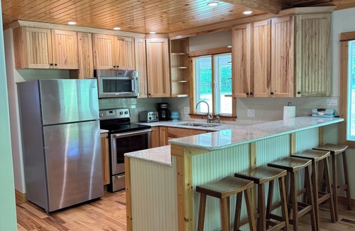 Thompsonville House | Woodland Escape with Stunning Riverfront Views