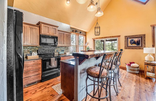 Lead House | Woodland lodge 1/4 mile from Terry Peak with private hot tub, firepit, fireplace